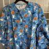 Blue Spiders Pumpwebs Halloween Scrub Jacket product image