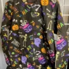 Bubble into the Trouble Halloween Scrub Jacket product image